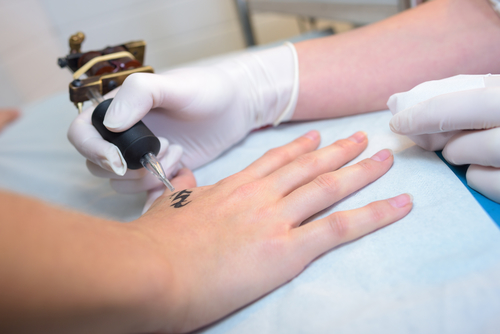 applying of tattoo and tattoo